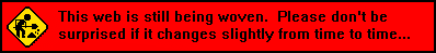 the words 'This web is still being woven. Please don't be suprised if it changes from time to time(dot dot dot)' on a red background. on the left there is a png of a black and yellow street sign of a simple figure shoveling dirt